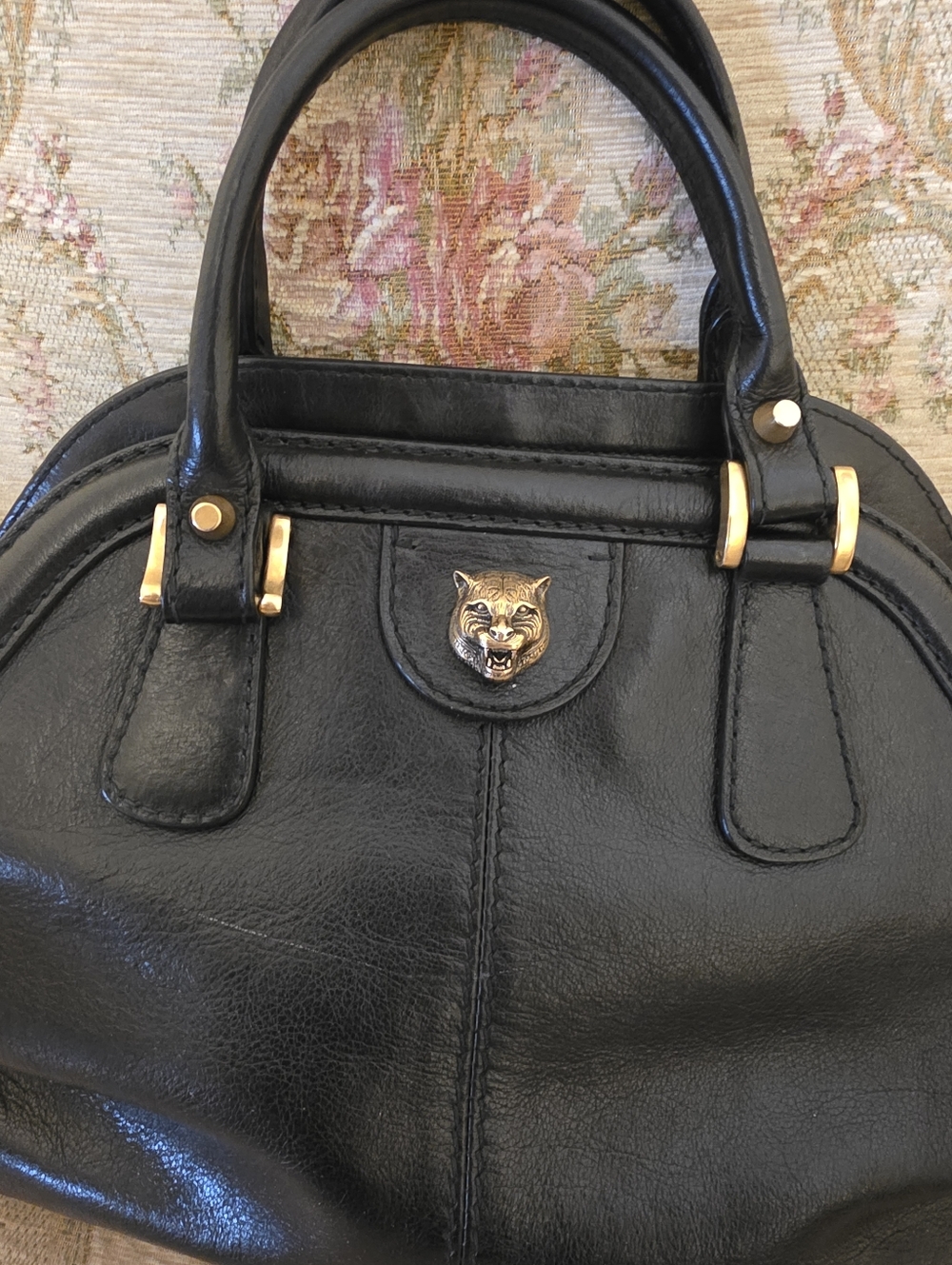 Luxurious Black Leather Satchel with Gold Accents